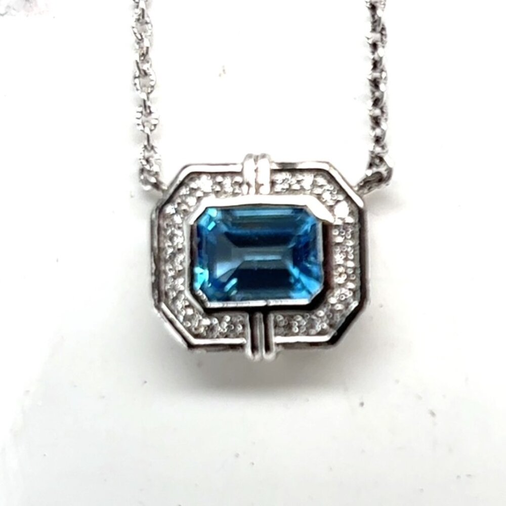 Sterling silver 16 inch necklace with diamonds and blue topaz
